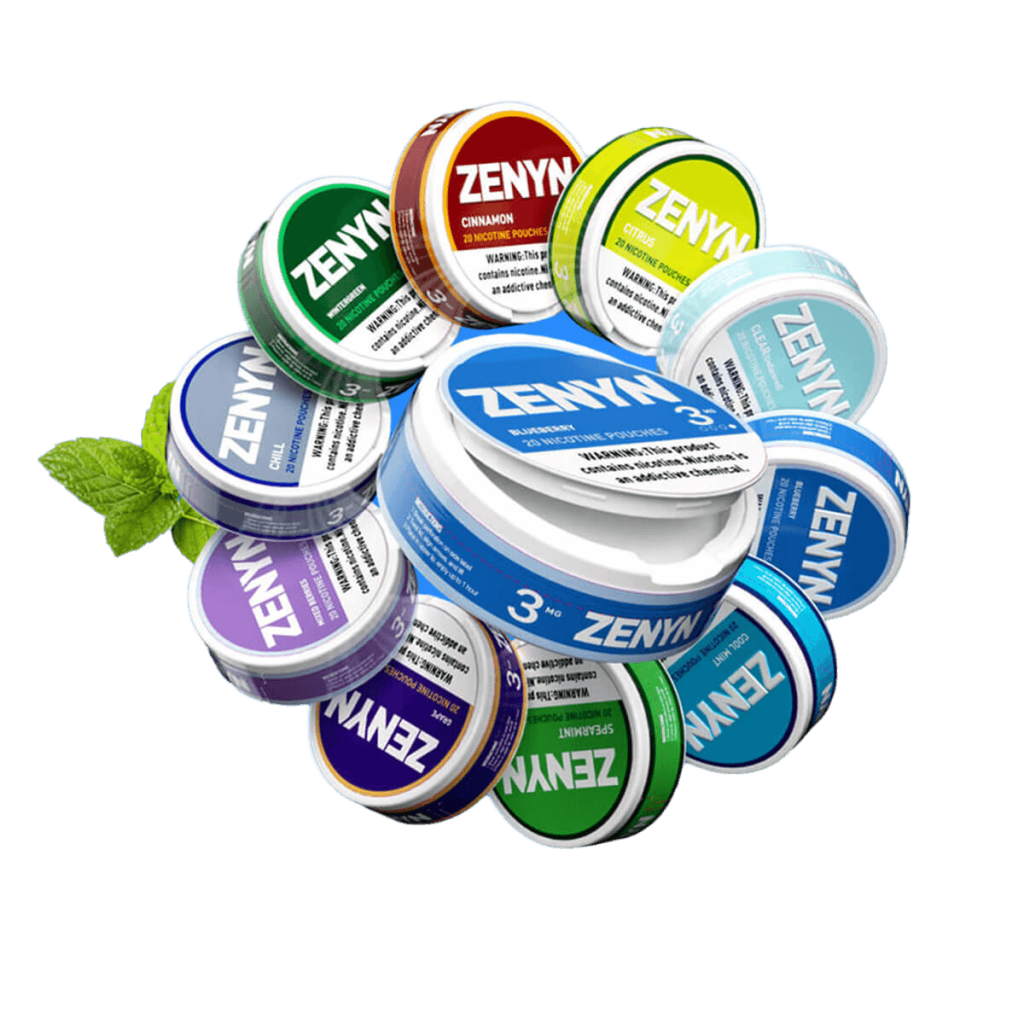 Assorted tins of ZENYN nicotine pouches in various flavors (e.g., mint, cinnamon, citrus) and nicotine strengths, accompanied by fresh mint leaves. These tobacco-free pouches serve as a discreet, smoke-free nicotine alternative, ideal for use in smoke-free environments or as a tool for smoking cessation, offering diverse options to match individual preferences.